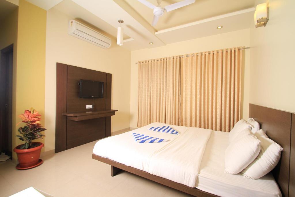 Hotel Sai Smaran Ширді Номер фото